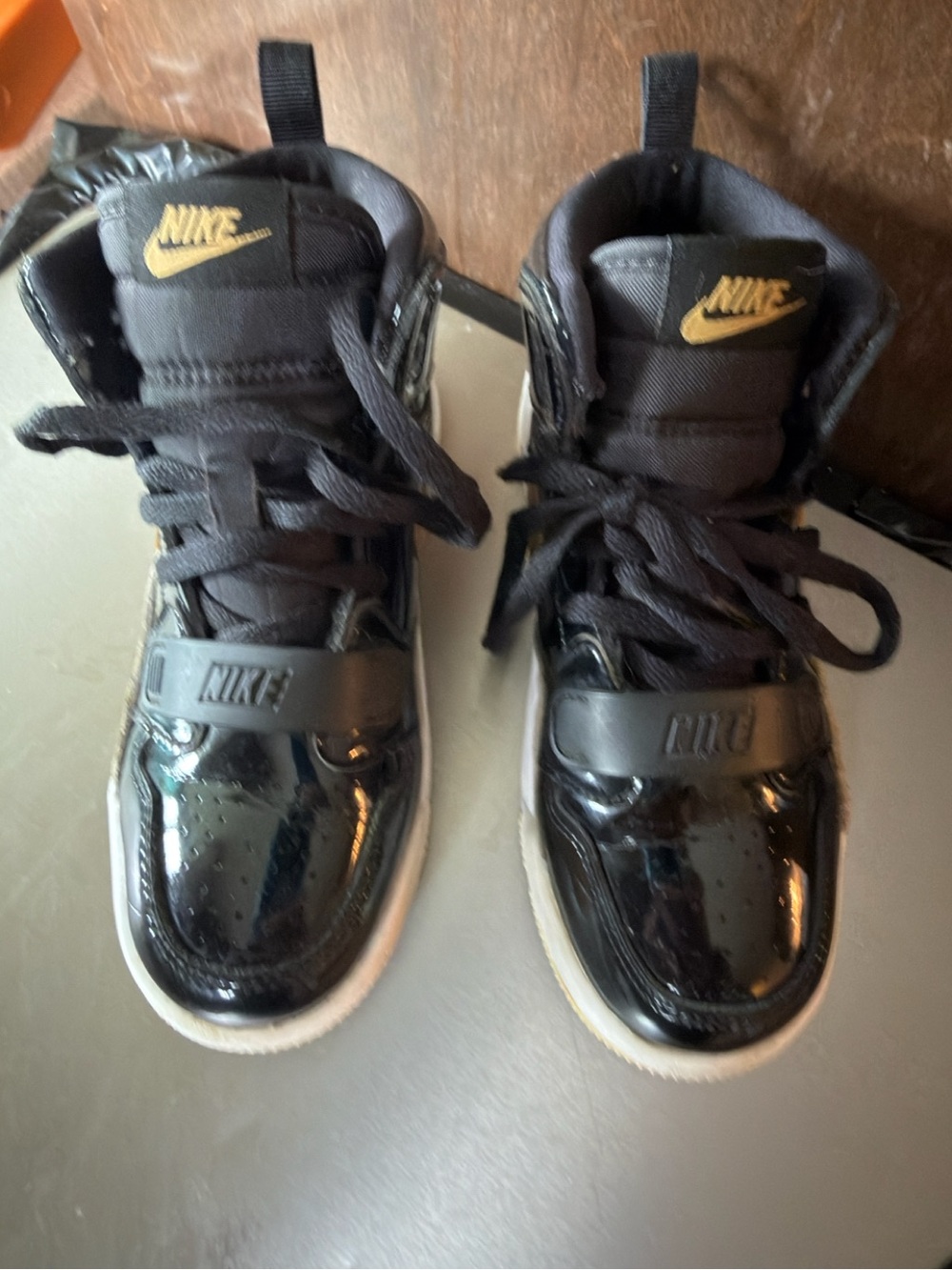 Jordan Kids' Black High-Top Sneakers with Gold Logo